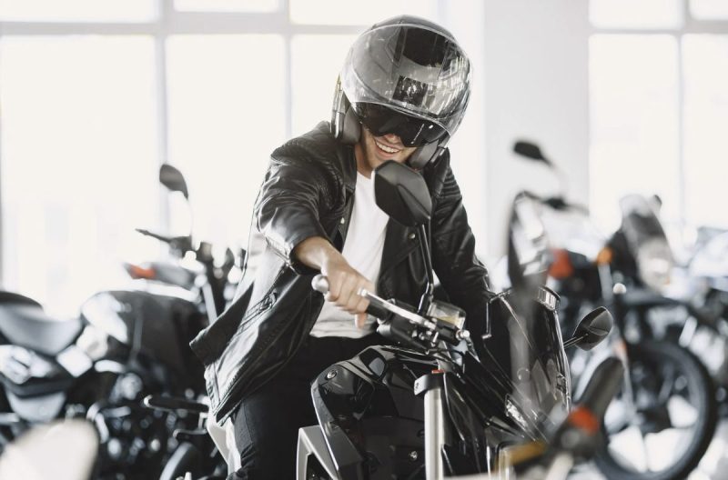 Biker shopping around and thinking, "how much is insurance for a motorcycle?"